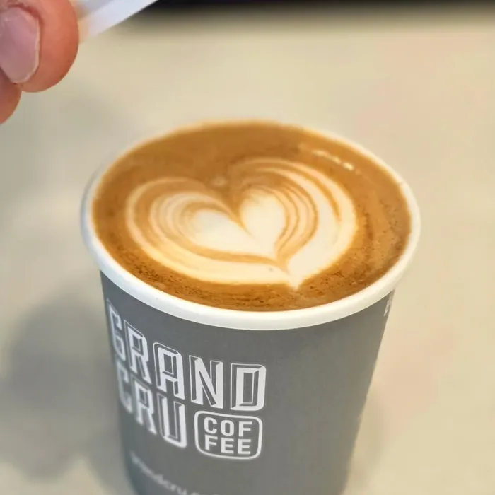 Grand Cru takeaway coffee with latte art