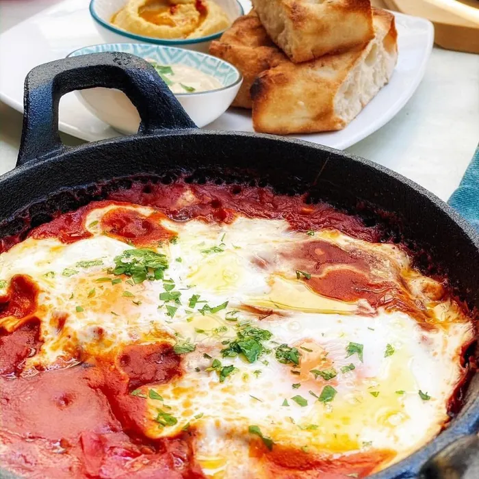 Shakshuka in a cast iron pan